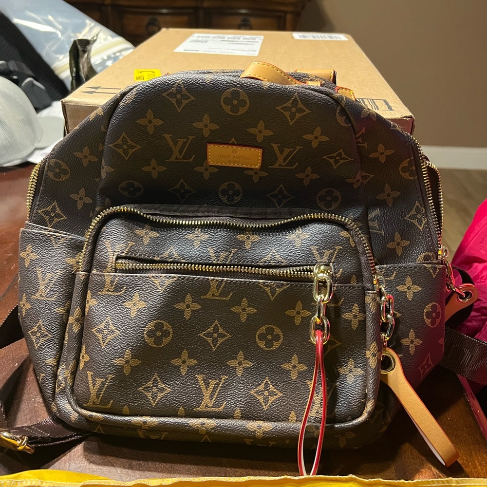 Beautiful imitation Louis Vuitton back pack in perfect condition!